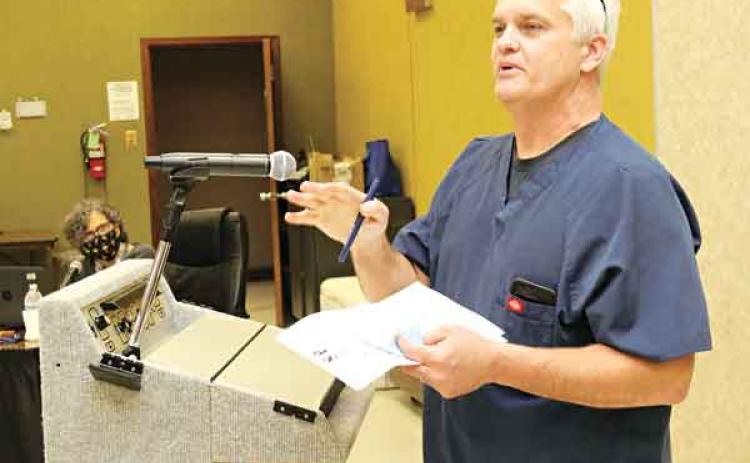 Dr. Robert Turk, of Eunice, talks about St. Landry Parish School district’s mask requirement at a meeting on Monday. (Photo by Harlan Kirgan)
