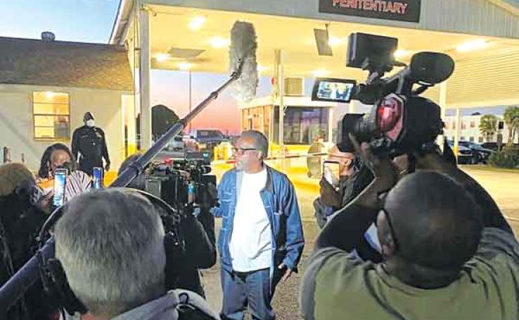 Vincent Simmons greets family, friends, supporters and a CBS national news crew as he leaves Louisiana State Penitentiary at Angola Monday night.  Simmons had served 44 years of a 100-year sentence after being convicted of two counts of attempted aggravated rape in 1977. In the hearing Monday, Judge Billy Bennett ordered a new trial, citing violations of Simmons’ constitutional rights in the original trial. District Attorney Charles Riddle said he will not prosecute Simmons, thus resulting in him being free