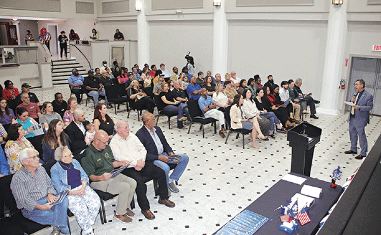 More than 200 people attended the annual meeting called by St. Landry Parish President Jessie Bellard to talk about parish government’s services and progress. The meeting was held at the Delta Grand Theatre in Opelousas on Tuesday. Bellard is standing at right. (Photos by Harlan Kirgan)