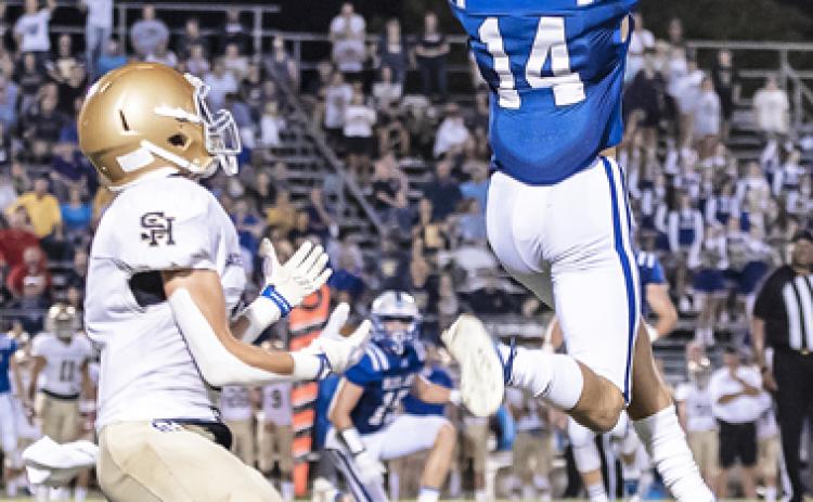 Mark Fruge snares an interception against Sacred Heart of Ville Platte