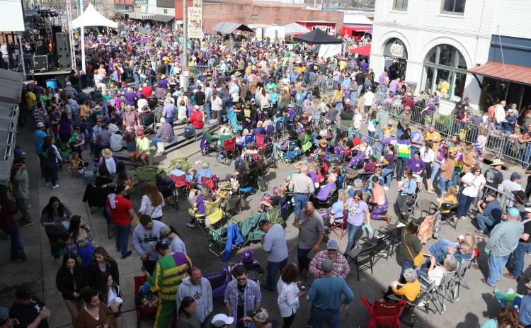 People jam 2nd Street in Eunice during Mardi Gras. (Photo by Harlan Kirgan)