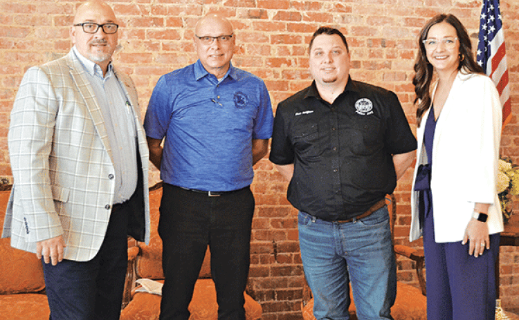 The Acadia Parish Chamber of Commerce hosted the annual “State of the Parish” luncheon Wednesday at The Grand Opera House of the South. Participants included, from left, Sheriff K.P. Gibson, Superintendent Scott Richard, Police Jury President Beau Petitjean and Chamber Interim CEO Elizabeth Milller, moderator. (Photo by Steve Bandy/Crowley Post-Signal)