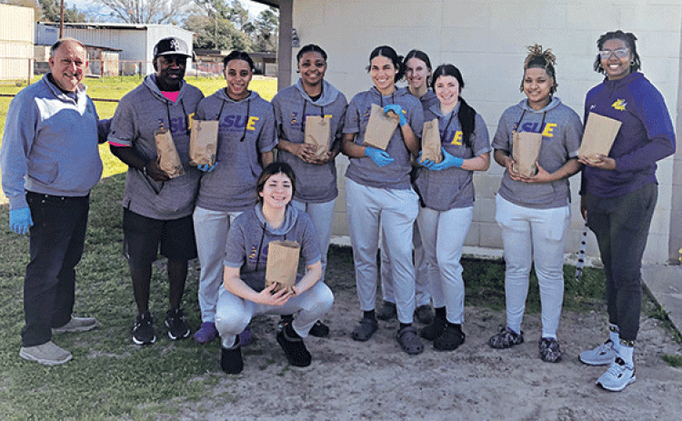 There was a barbecue burger fundraiser sale to benefit the LSUE Women’s Basketball team. The luncheon fundraiser was held at the VFW Hall on Bobcat Drive on Feb. 21. Coach Jamel Samuels extended a “Thank you” to the community of Eunice for supporting the team, and gave a special “Thank you” to the Eunice Community Health Clinic and Glynn Michaud. From left, are Randall Vigee, Basile State Bank; Head Coach Samuels; Kaylan Jack; Tierra Sylvas; Rylie Bergeron; and behind Bergeron is Brynn Hardie, Dayla Simon,
