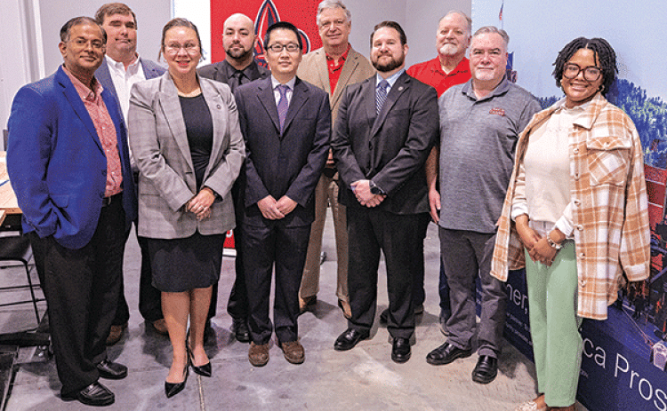 Front row, from left: Dr. Ramesh Kolluru, vice president of Research, Innovation, and Economic Development; Deidre Deculus Robert, director of state USDA Rural Development; Dr. Peng Solomon Yin, associate professor in Mechanical Engineering and principal investigator of the REAP grant; Chaston Price, coordinator of state USDA Rural Development Energy; Dr. Terry Chambers, director of the University’s EDA-funded Green Hydrogen Center of Excellence and its Energy Efficiency and Sustainable Energy Center and co