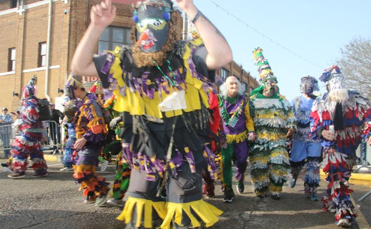 The Courir de Mardi Gras arrives to downtown Eunice.
