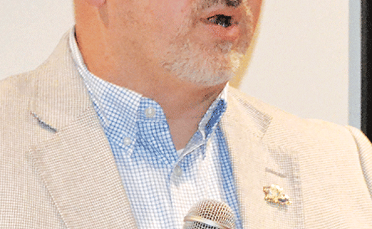 Acadia Parish Sheriff K.P. Gibson addresses a meeting of the Rotary Club of Crowley.