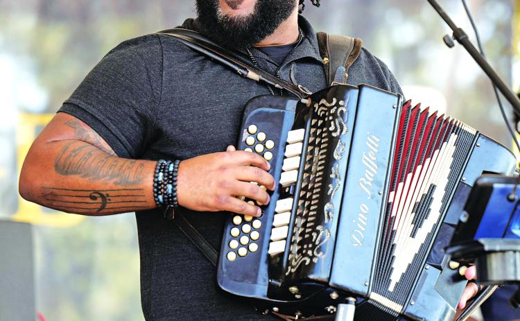 Chris Ardoin and NuStep Zydeko performed on the Heritage Stage Saturday afternoon, Oct. 15, 2022, during the 48th annual Festivals Acadiens et Créoles in Girard Park, Lafayette. (Photo by David Simpson)