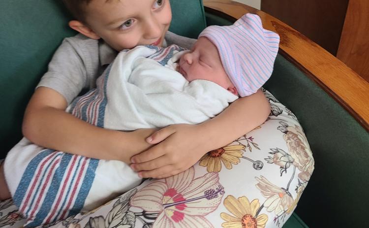 Azalee McGehee is with her older brother Brooks Henley McGehee
