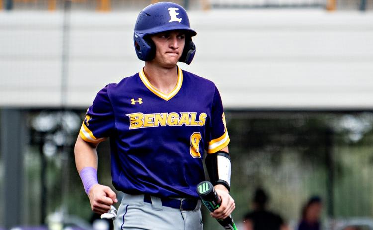 Milo Obradovich comes back to the dugout after scoring a run on Saturday. (Photo by Travis Webb)