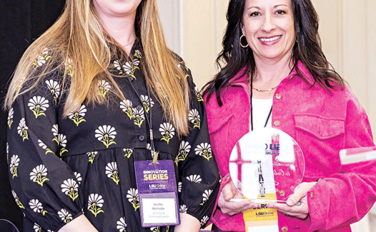 LSU Eunice assistant professor Nikki May, right, receives the Innovative Contributions to Online Learning at the recent Innovation Series from LSU Online and Continuing Education’s Jennifer Morrisette, left. (LSUE photo)
