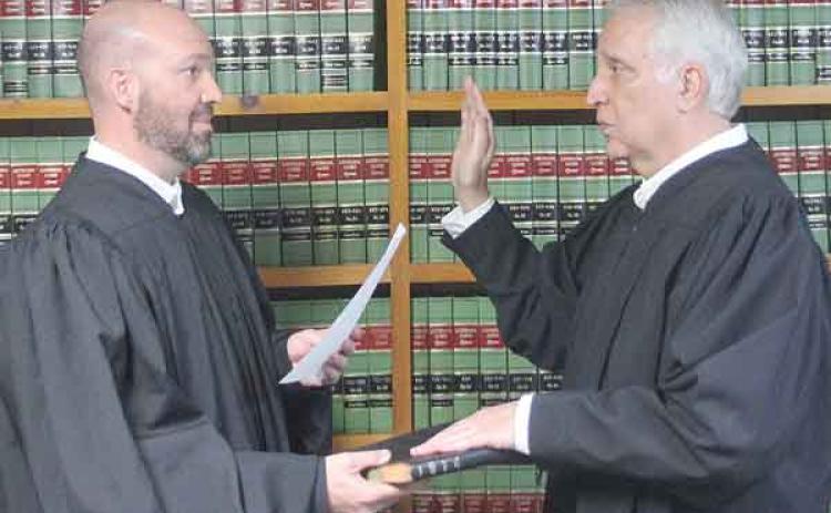 Ville Platte City Judge Greg Vidrine gives the oath of office to newly elected Appellate Judge Gary Ortego of Ville Platte. (Photo by Tony Marks/Ville Platte Gazette)