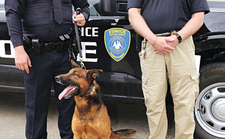 The Town of Mamou donated a police dog to the Eunice Police Department. The K9, named Amos, arrived Tuesday. With Amos, from left, are his new handler, Patrol Officer Keith Peters, and Police Chief Kyle LeBouef outside the Eunice Municipal Complex on Thursday afternoon. (Photo by Harlan Kirgan)