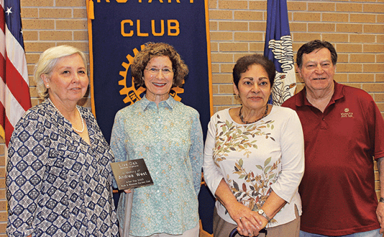 Celeste Gomez, president of the Bulb & Blossom Garden Club, was the guest speaker Wednesday at the Eunice Rotary Club. Gomez introduced the club’s newest project, the Nature Trail Tree Marker Replacement project. From left, are Fran Guillory, chairman of the club’s beautification committee; Gomez, Donna Baltakis, vice president of the club and incoming president; and Ellis Daigle, President-Elect of the Eunice Rotary Club. (Photo by Myra Miller)