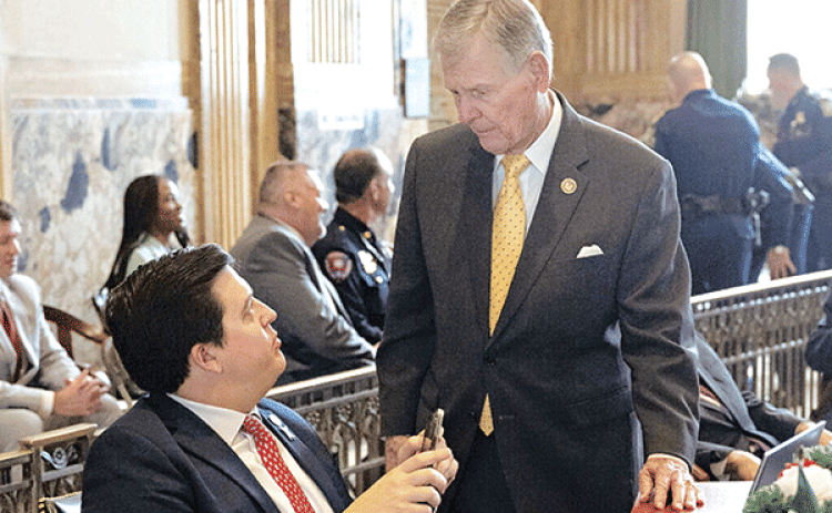 Rep. Dixon McMakin, R-Baton Rouge, seated, listens to Rep. Francis Thompson, R-Delhi, on opening day of the regular legislative session, March 11 at the Louisiana State Capitol in Baton Rouge. (John Ballance/The Advocate, Pool)