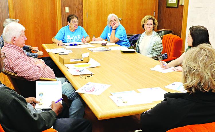 Keep Eunice Beautiful held a planning meeting for the Love The Boot cleanup scheduled April 22. The week of April 15-22 is Love the Boot Week across the state. The Eunice committee received a state grant that includes trash bags, grabbers and gloves for the event. Registration on April 22 will be from 8:30 to 9 a.m. at the Eunice Municipal Complex. The volunteers return to the complex around 11 a.m. for a group photo.  Shown above, clockwise from left, are Mark Dupre, Randy Cooper, David Simpson (mostly hid