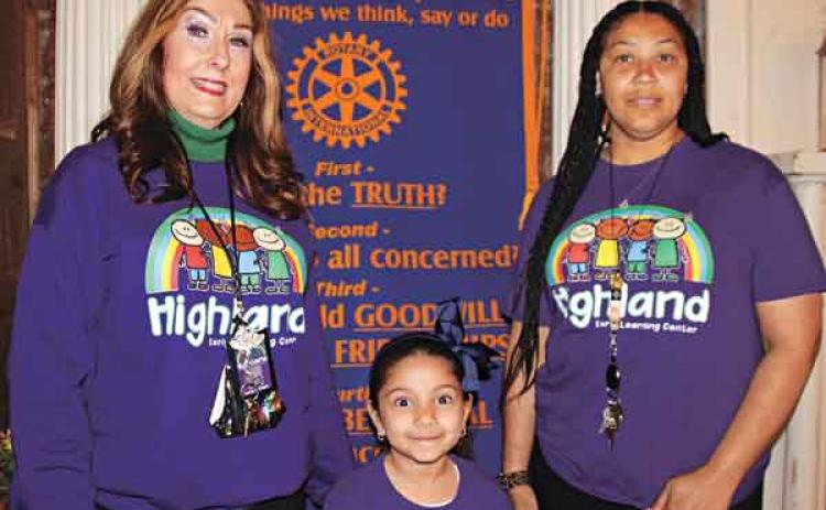 Lorie LeDoux, principal at Highland Early Learning Center, left, along with Sabah Hassan and Carla White were guests at Wednesday’s Rotary Club meeting. LeDoux and White gave updates on Highland Early Learning Center and Sarah read a Dr. Seuss’ story book to the Rotarians. (Photo by Myra Miller)
