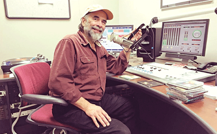 Lee Kleinpeter in the KRVS studio in 2016, where he produced some of his most popular radio shows. (Photo by KRVS Public Media)