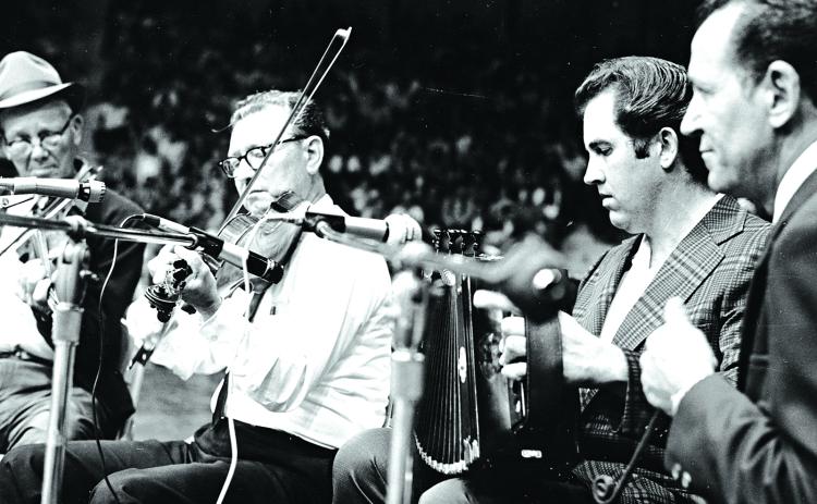 Performing at the Blackham Coliseum in a 1974 concert, from left, are Varise Conner, Lionel Leleux, Marc Savoy and Don Montoucet. The concert was the beginning of Festivals Acadiens et Créoles in Lafayette. (Submitted photo)