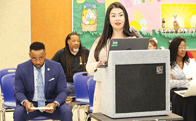 St. Landry Parish School Board member Tiffany Nolan proposes a new school violence policy at a committee meeting. Also shown, seated, from left, are Courtney Joiner, Board attorney; Rod Sias, parish NAACP president; and Shaun Grantham, finance director. (Photo by Harlan Kirgan)