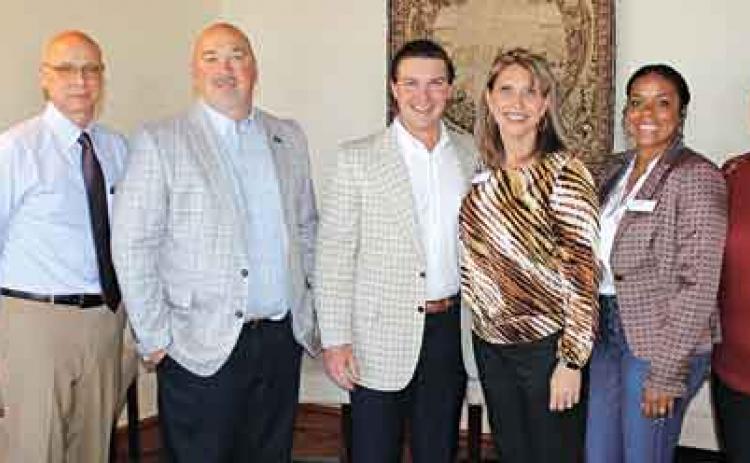 Hosts and speakers for Friday’s State of the Parish Luncheon held at The Grand Opera House in Crowley were, from left, Megan Duhon, Acadia Parish Chamber of Commerce president and CEO; Scott Richard, superintendent of Acadia Parish public schools; K.P. Gibson, Acadia Parish sheriff; Chance Henry, Acadia Parish Police Jury president; Tracy Wirtz, Cox public / media relations manager; Laycie Lewis, Cox public affairs specialist; and Jennifer Middlebrooks, Cox local sales manager. (Crowley Post-Signal photo)