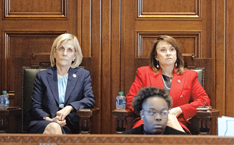 Louisiana Secretary of State Nancy Landry, left, sits with Louisiana Attorney General Liz Murrill as Gov. Jeff Landry speaks on opening day of a legislative special session focusing on crime, Feb. 19, at the State Capitol in Baton Rouge. (Hillary Schienuk/ The Advocate, Pool)