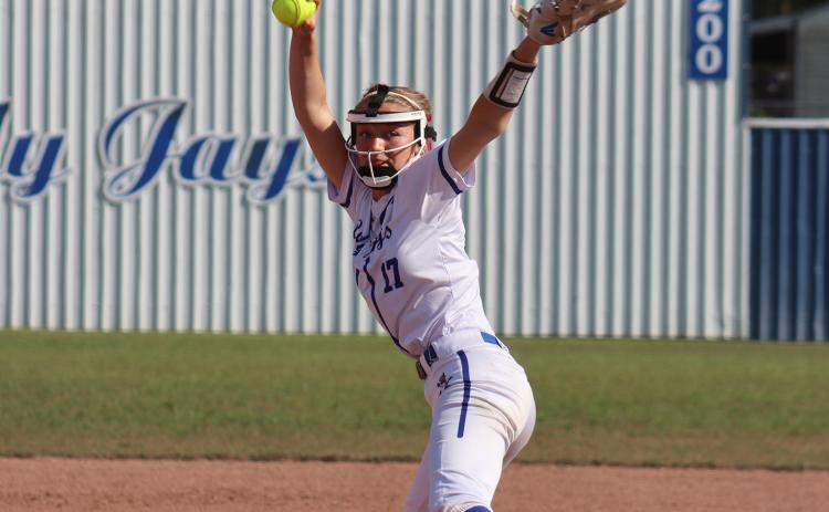 St. Edmund defeated Lake Arthur in 5 innings Monday, March 30 with a score of 16-2. Pictured is Brianna Lopez pitching for the team. (Photo by Amy Myers)