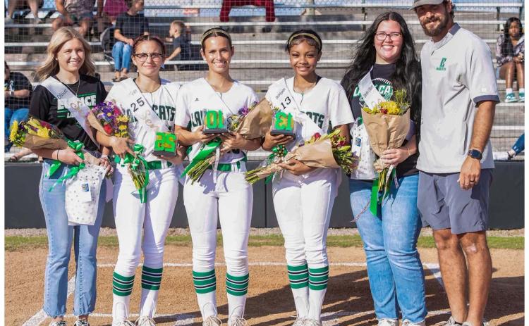 Eunice High Lady Cats Senior night was recently held. From left are Olivia Fuselier, Myka Grace Fontenot, Sydni Miller, De’Miyah Reed, Sarah Claire Vienne and Coach Trenon Trosclair.