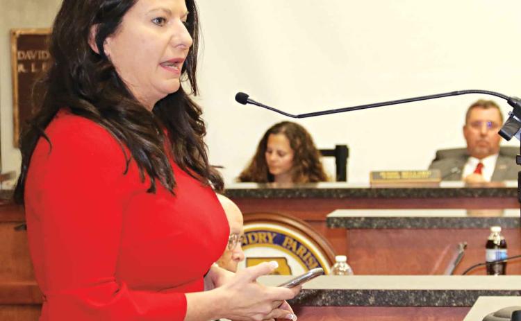 Bambi Polotzola speaks to the St. Landry Parish Council in favor of removing a monument to Confederate soldiers from the St. Landry Parish Courthouse grounds. The meeting was held Wednesday. (Photos by Harlan Kirgan)