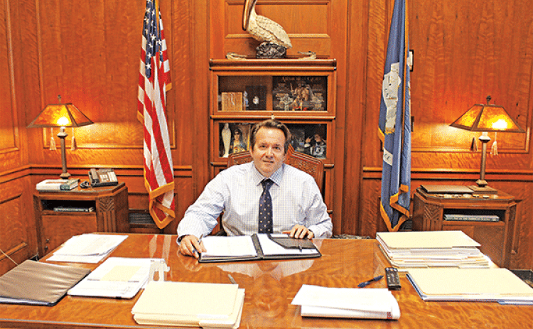 Speaker of the House and State Representative Phillip DeVillier sits at his desk in his office at the state capitol. DeVillier, of Eunice, was first elected as a state representative in 2015. (Photo by Claudette Olivier/Church Point News)