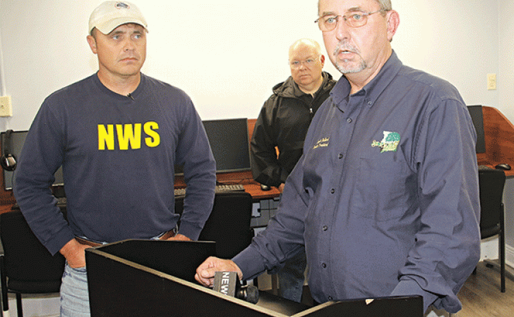 St. Landry Parish President Jessie Bellard, right, speaks at a news conference about Wednesday’s storm held Thursday at the parish courthouse in Opelousas. Also shown, from left, are Doug Cramer of the National Weather Service and Van Reed, parish Emergency Preparedness director. (Photo by Harlan Kirgan)