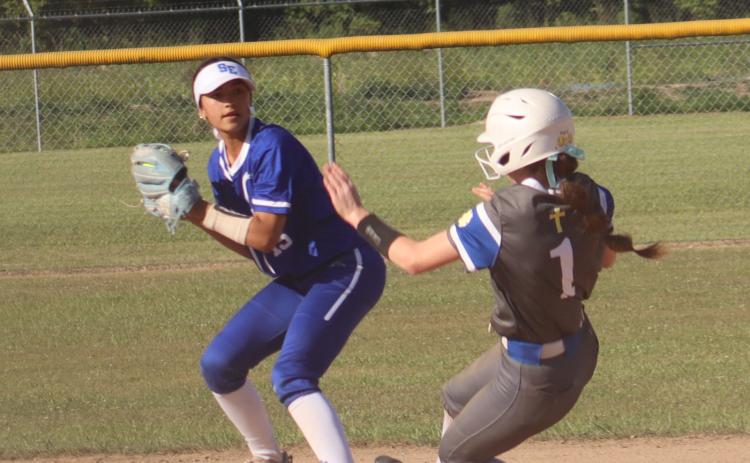 The St. Edmund Lady Jays traveled to Crowley Tuesday to take on the Northside Christian Warriors. The Jays came home the victor with a 7-4 win. Pictured is Rory Langlinais making an out at 2nd base and looking for a double play a first. (Photo by Amy Myers)