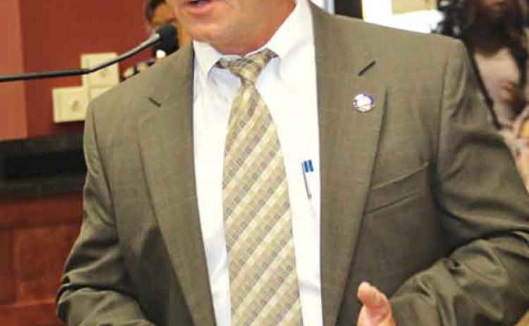 St. Landry Parish District Attorney Chad Pitre voices support for the Acadiana Crime Lab at Wednesday’s Parish Council meeting. (Photo by Harlan Kirgan)