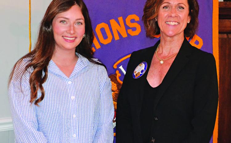Victoria Callahan, left, sales representative for Parish Rice, was guest speaker for the recent meeting, explaining the health benefits of the Eunice-based product. Welcoming her to the meeting is Nancy Loewer, program chair. (Photo by Steve Bandy/Crowley Post-Signal)