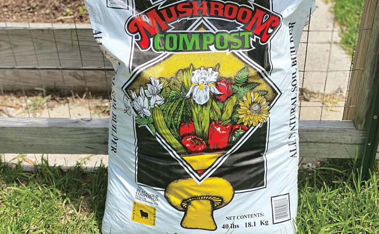 Mushroom compost can add nutrients to soils and potting media.  (Photo by Heather Kirk-Ballard LSU AgCenter)