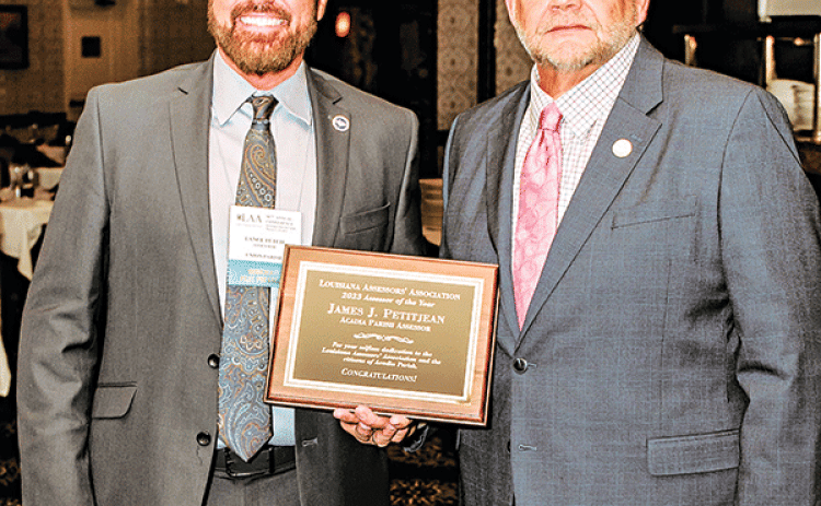 Acadia Parish Assessor James J. “Jimbo” Petitjean, right, was named the “2023 Assessor of the Year” at the90th annual Assessor’s Conference held recently in Bossier City. Presenting the award was Louisiana Assessor’s Association Immediate Past President Lance Futch. (Submitted photo)
