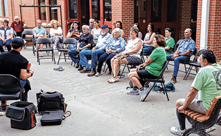 The free Rendezvous in the Prairie program featured Drew Simon and Megan Constantin, members of the trio T’Monde, performing Cajun standards, their versions of country songs in French and English, and their own original Cajun songs. The program on Thursday was moved outdoors on a beautiful spring evening. Next month, the program, 5:30 to 6:30 p.m. on Thursdays, will be back inside on the center’s Front Porch Stage featuring the David Greely Duo May 1, Sarah Jayde Williams May 8, the Holiday Playgirls May 15
