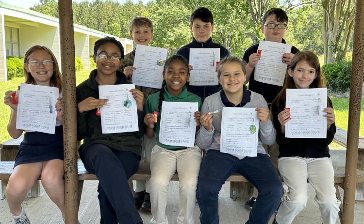 Fourth graders in Mayria Ledet’s homeroom has reached their iReady goal. Seated, in front, from left, are  Harlee Richard, Carliss Bellard, Zendaya Hunt, Zeyia Williams and Gabriella Fontenot. In back, from left are Blake Carrier, Zander Philiips and Bailey Hancock.