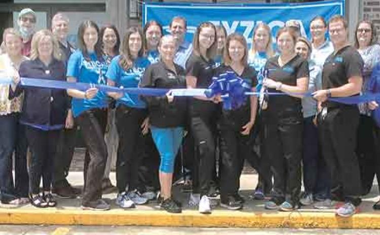 The Eunice Chamber of Commerce sponsored an open house and ribbon-cutting ceremony for Fyzical Therapy & Balance Center, which is celebrating five years in business and announcing they are opening another location in Ville Platte in the summer. (Photo courtesy of Ric Nesbitt/KEUN)