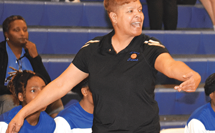 North Central coach Vanessa Taylor gives instruction to her team against St. Edmund during the 2022-23 basketball season. (Photo by Tom Dodge)