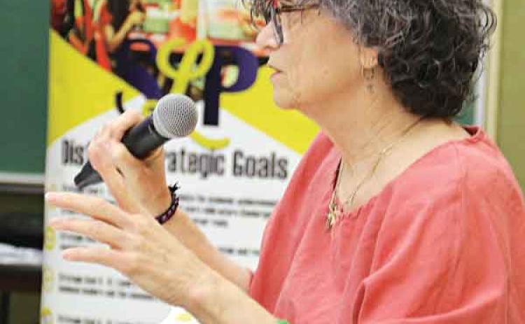 St. Landry Parish School Board Member Mary Ellen Donatto makes her point about closing or consolidating schools at meeting on Monday. (Photos by Harlan Kirgan)