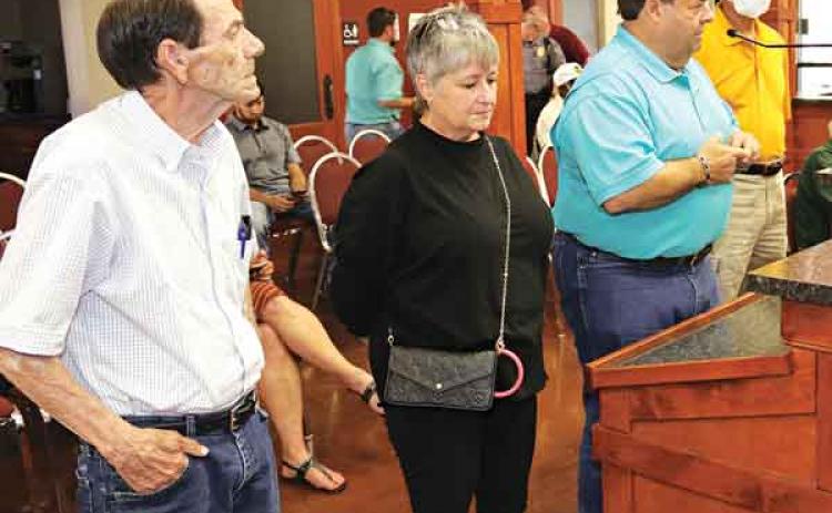 St. Landry Parish Council members were reassured the new trash pickup service to start in October will be successful. From left, are Jack Ortego, Jody Powell, Richard LeBouef and Edward Briscoe, all of the St. Landry Parish Solid Waste Commission. (Photo by Harlan Kirgan)