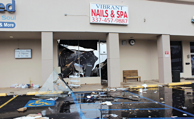 Vibrant Nails & Spa located at 143 North Bobcat, Eunice, was destroyed early Friday morning. According to one of the owners Kim Keohavong, “It was an old building. It appears the roof caved in. I know we did experience bad weather as well.” Owners Kim and Bobby Keohavong rented the building space from Samco Properities. The nail salon business has been open since 2014. (Photo by Myra Miller)