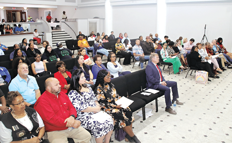 The crowd listens to the St. Landry Parish School Superintendent candidates on Monday in the Delta Grand Theater in Opelousas.