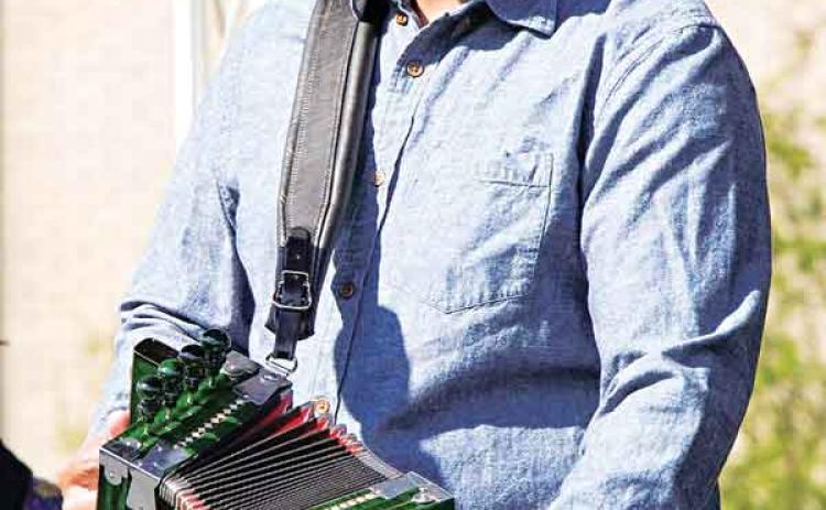 McNeese State University senior Kaleb LeDay performs with the university’s zydeco band, Zyde-Pokes. (Photo courtesy of McNeese State University)