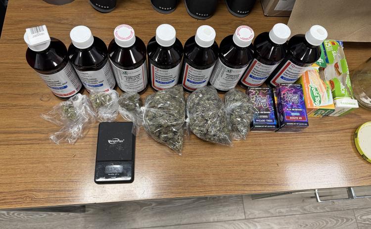 Eunice police seized more than five ounces of suspected marijuana, multiple boxes of THC vape cartridges and eight bottles of prescription cough syrup during a Wednesday raid at a West Park Avenue home, leading to the arrest of a 28-year-old Eunice man on felony drug distribution charges. (Submitted photo)