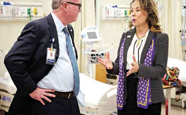 LSU Eunice Chancellor Nancee Sorenson, right, and Ochsner Lafayette General CEO Patrick Gandy are inside the Ochsner Lafayette General Orthopedic Center at the LSU Eunice Allied Health Campus in Lafayette. On Wednesday, the two groups announced a $700,000 expansion. (Photo courtesy of LSU Eunice)