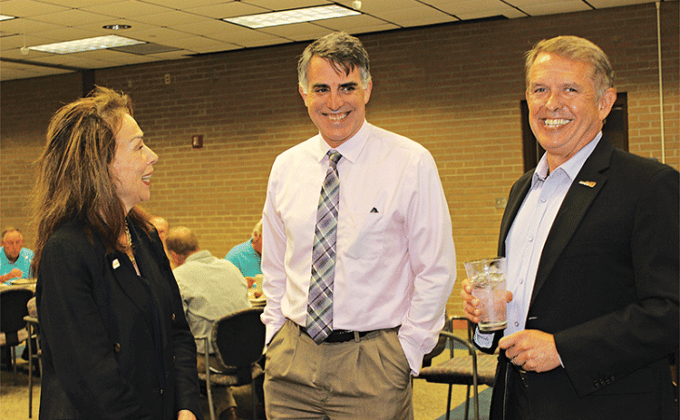 Bill Rodier, right, chief executive officer of St. Landry Economic Development, was the guest speaker Wednesday at the Eunice Rotary Club meeting. Prior to speaking Rodier was with with Nancee Sorenson, LSUE chancellor, and  John Hamlin, LSUE vice chancellor of Academic Affairs & Provost. (Photo by Myra Miller)