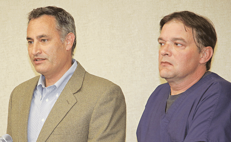 From left, Dr. Zebediah Stearns, coroner, and Toby Savoy, chief investigator. (Photo by Harlan Kirgan)