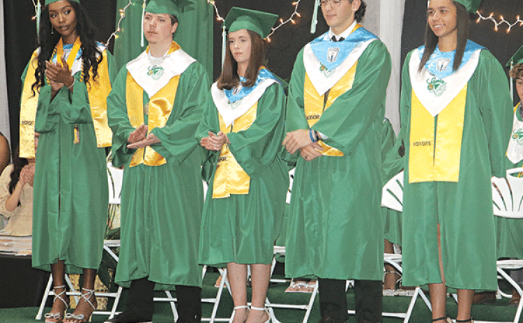 The top five Eunice High School graduates are, from left, Fajah Guillory, Elijah Johnson, Ava Landreneau, Juien Granger and Adayvia Jones. The photo was taken at Wednesday’s commencement at the high school.  (Photo by Harlan Kirgan)