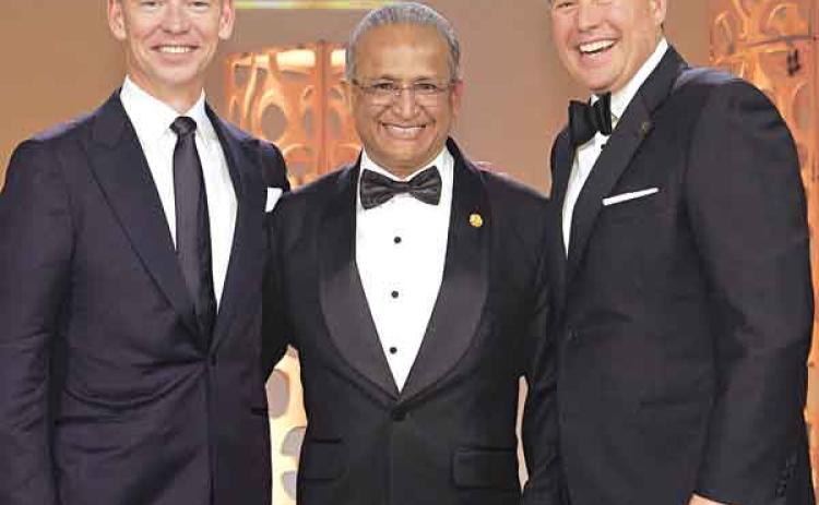 McDonald’s Franchisee Ajay Patel, center, is with McDonald’s President and CEO Chris Kempczinski and McDonald’s USA President Joe Erlinger.  (Submitted photo)
